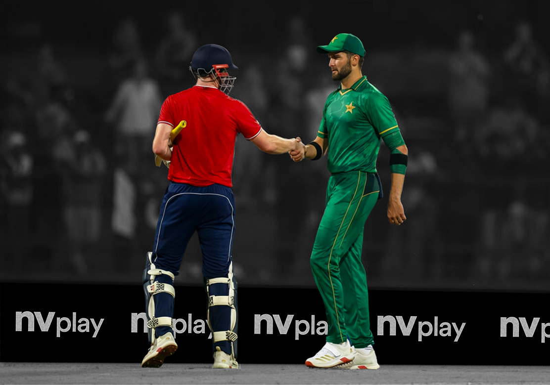 Two professional players shaking hands at a match with NV Play logo in background